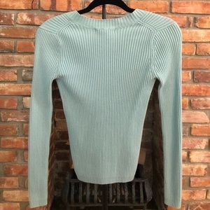 light turquoise sweater